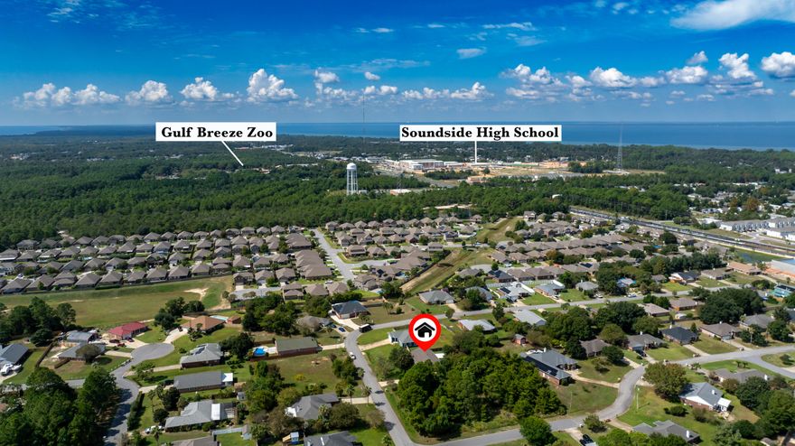 *Under Contract with Kick Out Clause* Triple Lot Treasure in a Prime Family-Friendly Location!Step inside this beautifully updated 4-bedroom, 2-bath home, perfectly positioned just one mile from the Gulf Breeze Zoo and under 20 minutes to Navarre Beach. Set on a rare triple lot, this property offers plenty of space for outdoor fun, gardening, or future expansions:House Lot: 100 x 159 x 101 x 176Second Lot: 90 x 100 x 125 x 75Third Lot: 125 x 86 x 127 x 97Recent updates make this home move-in ready and stylish:Roof & water heater - 2024Fresh interior paint - Sept 2025Front bedroom flooring - Sept 2025Updated light fixtures, ceiling fans & door hardware - Sept 2025Lawn pump - Aug 2024Pool pump - 2023 The split-bedroom floor plan provides privacy and versatility, with a bright kitchen featuring a breakfast bar and cozy nook for casual dining, plus a formal dining area for gatherings. The primary suite is your private retreat, complete with a walk-in closet, double vanity, soaking tub, and separate walk-in shower.
Florida living shines with an enclosed patio, sparkling inground pool, and a large privacy-fenced backyard. A workshop with electricity offers endless possibilities for hobbies, projects, or extra storage.
With Soundside High School opening Fall 2026 nearby and Highway 98 improvements on the way, this home combines comfort, convenience, and long-term value. Don't miss this unique opportunity to own a spacious, updated home on a rare triple lot!
