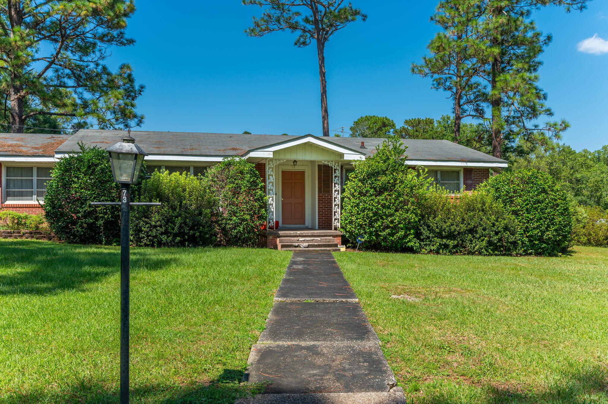 This beautiful one-story brick home is the epitome of comfort and style of years gone by. The spacious living room is designed for quality time with loved ones, while the three bedrooms and two bathrooms offer privacy and convenience. Outside, you'll love the generous corner lot, providing endless opportunities for outdoor fun, gardening, or simply enjoying the Florida sunshine. With its excellent location in DeFuniak Springs, you'll have easy access to schools, shops, dining, and more, making it an ideal choice for families and anyone seeking a welcoming community. Do not let this opportunity pass you by! Requirements are a credit score of 600, household income of $4250 per month and one year consistently employed.