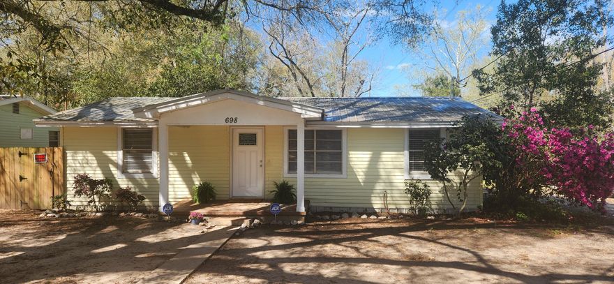 Great affordable home on a corner lot with lots of upgrades and Ready to MOVE IN! 4 bedrooms 2 full baths, new flooring, updated kitchen and baths with fresh paint. All appliances convey including refrigerator, washer and dryer. Nice security fenced backyard with gates. Great for the first time buyer or investor for rental income. Seller will provide a one year home warranty for peace of mind! Come and look today!