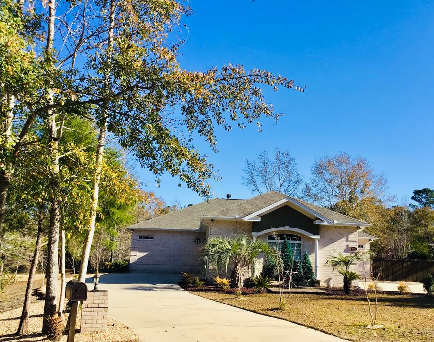 Custom Built split bd-rm 2500 sq ft.  4-bedroom Brick home on large lot plus a 1 -bedroom studio with private bath, making a total of 5 bedrooms and 3 1/2 baths. Studio is not included in sq footage.  Need a home with a lot of parking ...this is it.  Home is move in ready and 2020 updates and upgrades are impressive.  Starting with a new roof, two 40-gallon hot water heaters, whole house water filtration & water softener.  All new appliances. New Hardwood floors and so much more. Interior walls and trim painted. Complete list available. You enter through Beautiful  9 ft. Mahogany double doors with leaded glass to foyer with marble tiles. Dining room has hardwood floor and tray ceiling w/ double window & plantation shutters. Kitchen has granite counters, breakfast bar, two sinks,