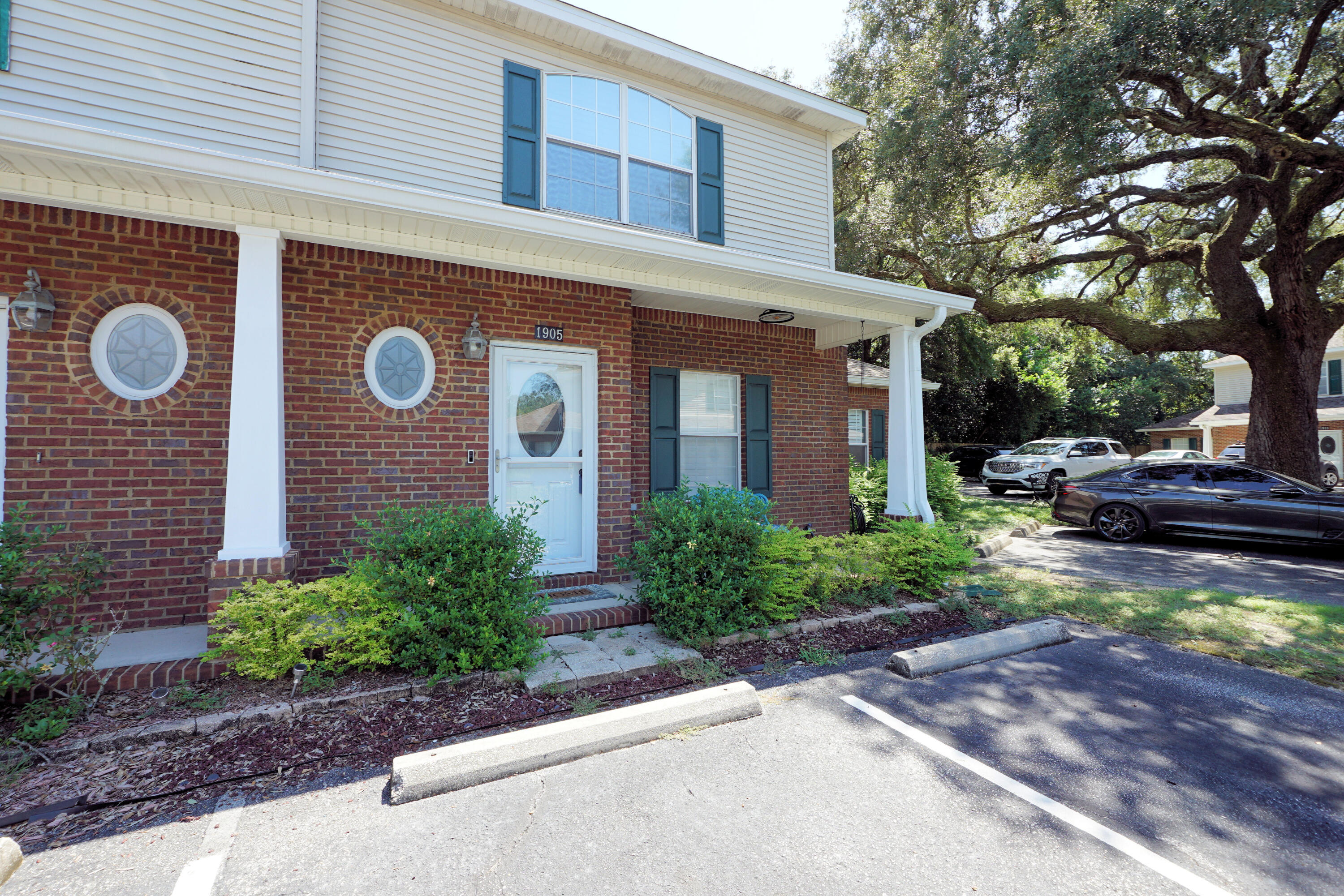 Charming end unit townhome with a NEW ROOF in Grand Oak Place, located in the center of Niceville on a quiet dead end street close to schools and shopping. Being an end unit, you will enjoy the privacy of being next to the grassy common area as well as having a low maintenance paver patio in the tidy back yard. The open concept living area downstairs features neutral tile flooring and a nicely appointed kitchen with updated appliances, granite counters and plenty of cabinets. The master suite is also downstairs and there are two additional bedrooms and another full bath upstairs. This property would make a wonderful primary residence, second home or could serve as a great investment property! Come and see it today...this is what you have been looking for!