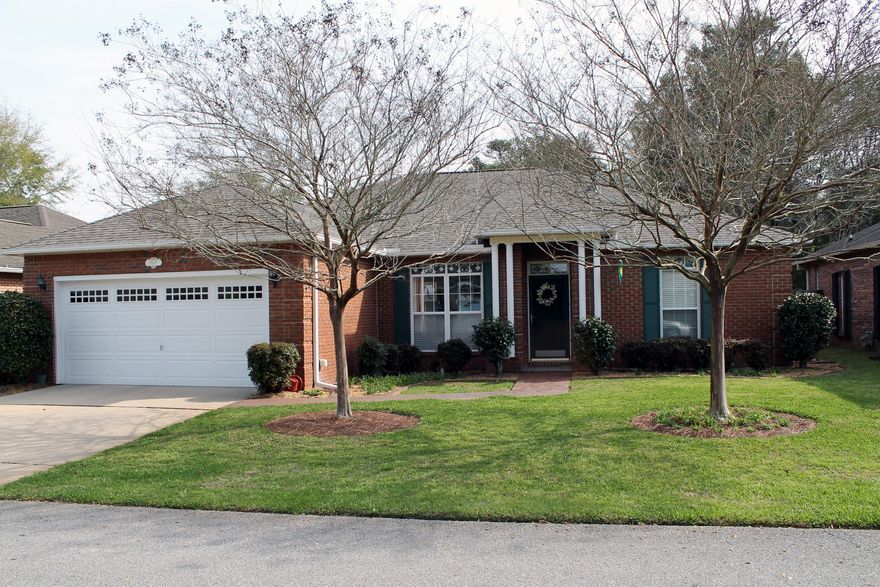 This cute split bedroom contemporary should suit your every need! Great location within walking distance to Bluewater Elementary and a short drive to Eglin AFB and the beach. The family room offers high ceilings and sliding doors out to the screened porch. The kitchen features plenty of storage and new quartz counters. The breakfast nook overlooks the pergola and the flowering camellias, azaleas, and apple tree in the yard. If you have large bedroom furniture, you'll be happy with the layout of the master bedroom which also sports a nice walk-in closet. The tiled master bath features a corner marble garden tub, a separate shower, and marble-topped vanity. The additional two bedrooms each offer more than adequate closet space. Come see this charming home and all that it has to offer.