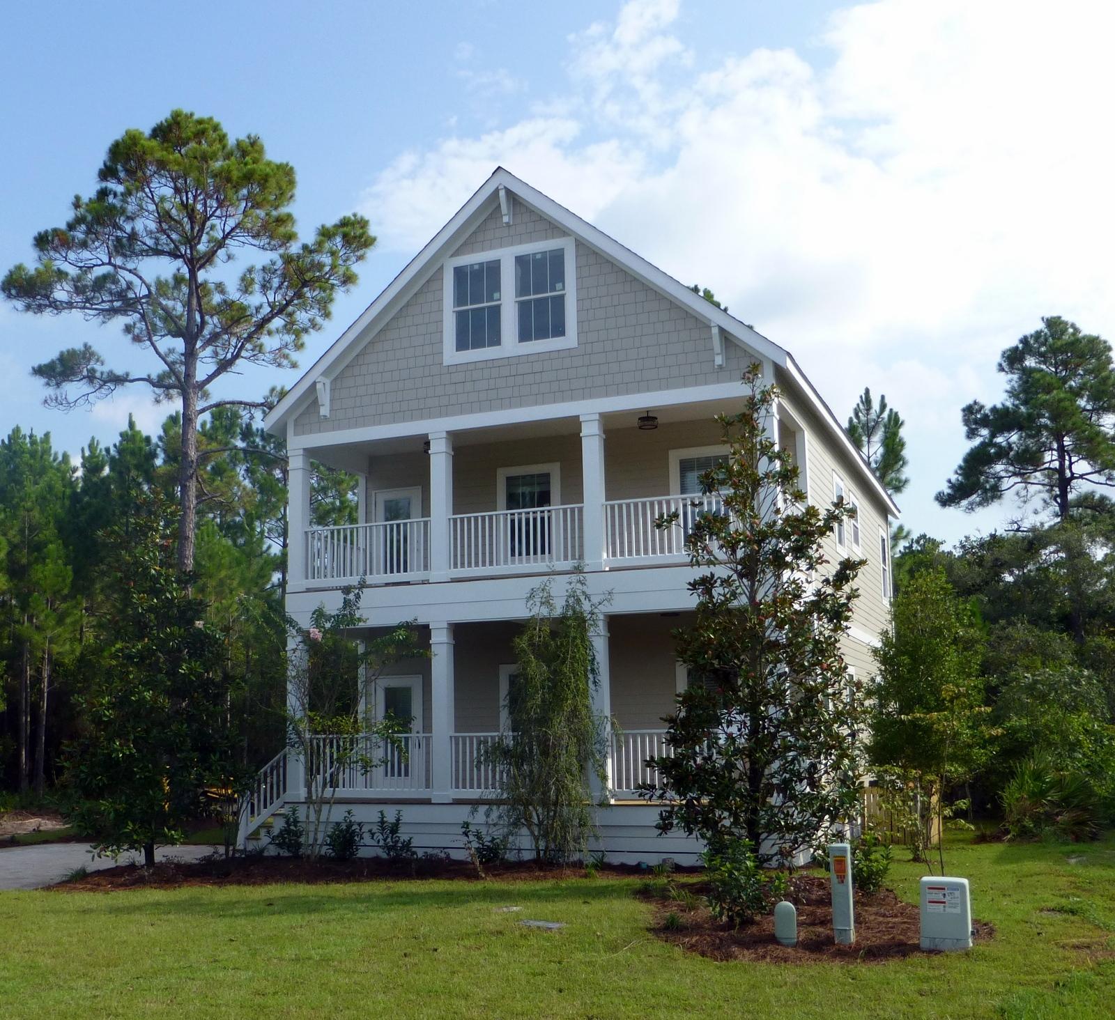 Direct walk to the beach! 44 Wood Beach is under construction and we expect finish date to be a few weeks away. Home comes complete with huge porches, amazing panoramic views of neighborhood, large living spaces, walk in laundry room, brick pavers, large closets, foyer area to hang your beach towels and not walk directly into a living space, stainless appliances, Watercolor style finishes and much more. Elevations allow lots of room to grow! Room for pool and a or carriage/garage. Sugarwood is a well maintained upscale subdivision with underground utilities. This home will make a great vacation rental, full time residence, and or a second home. We call this the ''trifecta''! Home can also be 5 bedrooms with addition to 3rd level. See Bobby for details.