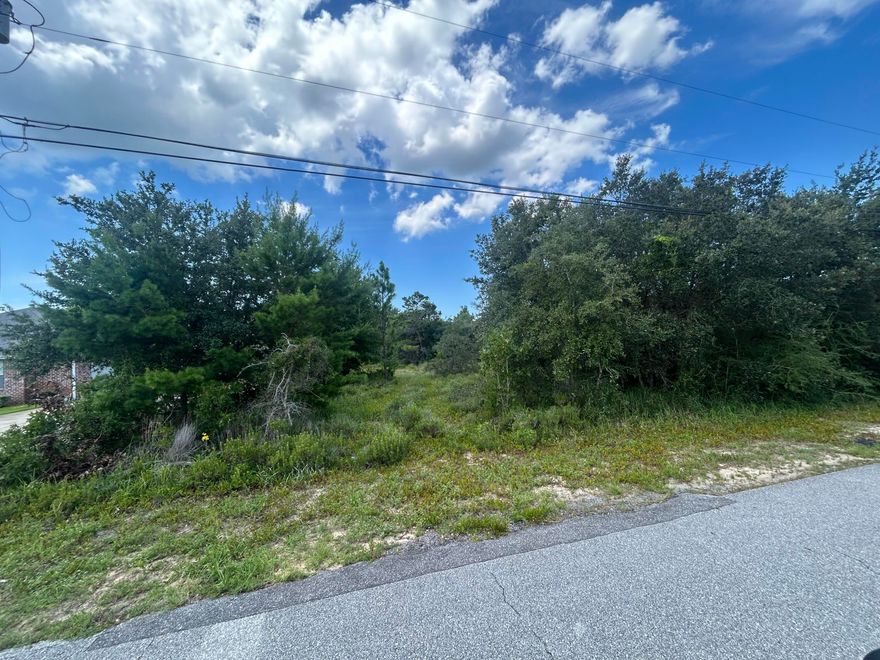 High & Dry lot in Holley By the Sea.  Multi Family zoning lot.  Located in the heart of Navarre in the desirable neighborhood Holley By the Sea, this community's multimillion dollar recreation center, pools, tennis and dock on the intracoastal waterway. Wetland study and survey available.