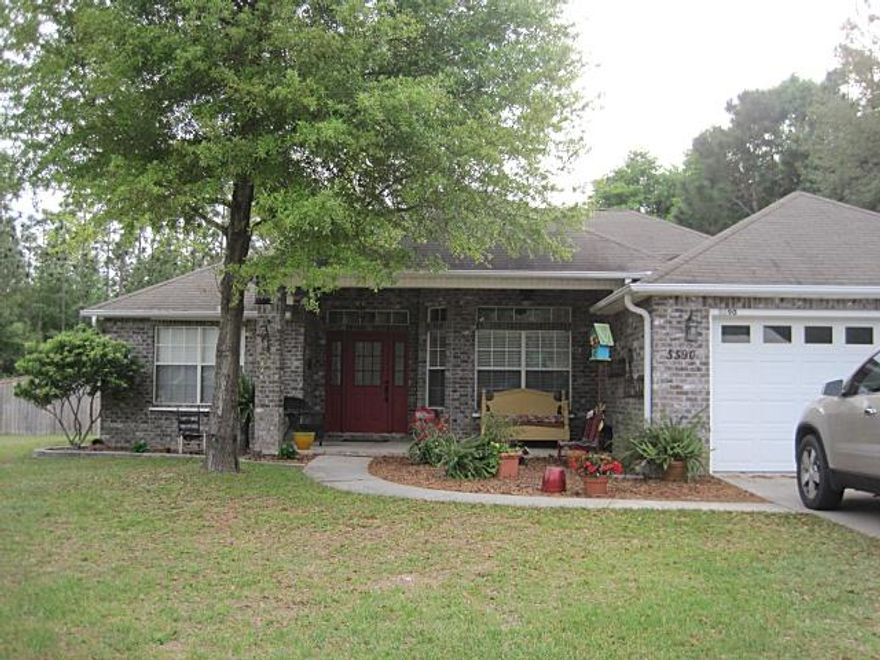 Gorgeous!!! 3 bedroom 2 bath home on a level 1 acre lot in Baker. Tiled throughout with carpet in the bedrooms only. Nice open kitchen with a pantry. Split floor plan. Master bathroom has a whirlpool tub with tile back splash, double vanity, walk in shower and a ceiling fan. 2 car garage, gutters, rear patio and hurricane shutters for the windows. Fenced back yard. Quick 10 minute commute to Crestview. Easy commute to Duke field and Eglin.