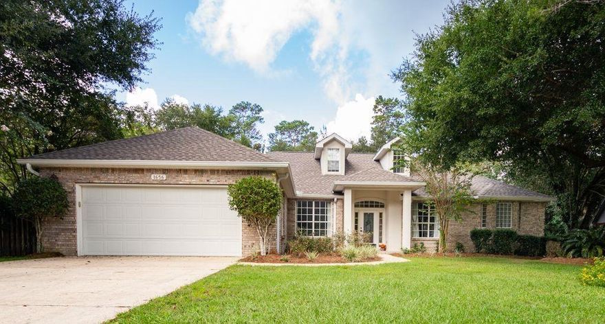 This custom 4 bedroom 3 full bath brick home sits on .34 acres in the desirable neighborhood of Parkwood Estates. With Bluewater Elementary right down the street, the kids can walk out of the back gate and be to school in minutes. You will love all the windows and French doors that let the beauty of outside in. There is a formal dining room and eat in kitchen and two living areas. The master bedroom also has French doors  to the screened porch and an attached master bath with two walk in closets, whirlpool tub and separate shower.  There are two guest bedrooms and an additional full bath downstairs. Upstairs is another bedroom and full bath. Roof was replaced in 2018 & HVAC system a few years ago also. Termite bond is in place for peace of mind. Agent has ownership interest in property.