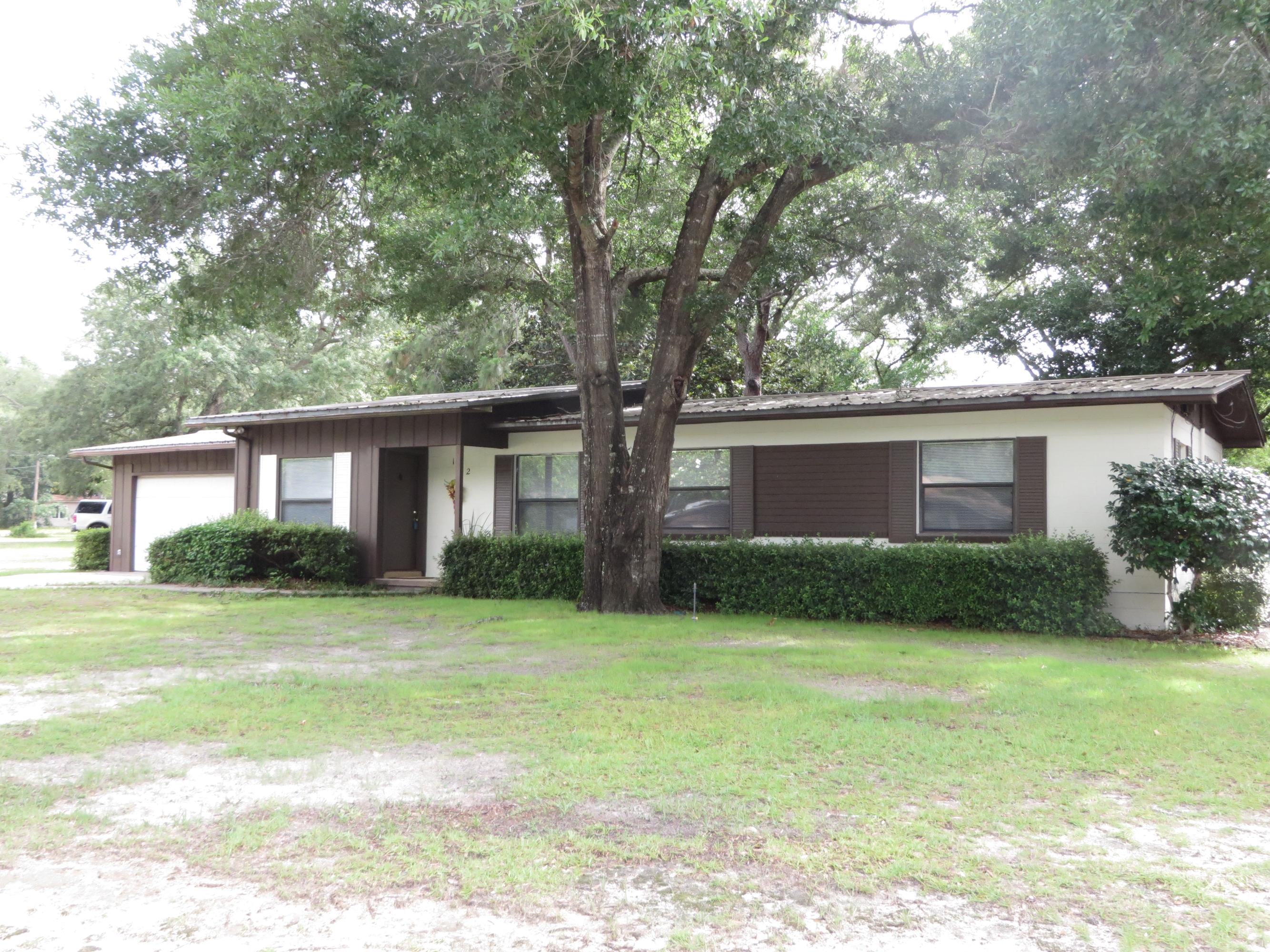 Don't let age of this home scare you away. It is move in ready located in the heart of Niceville. The owner has just completed a renovation of the home. Mostly new paint, new floor in bathroom, new fans, new lighting, new tile backsplash in kitchen, new back door and new windows in 2014. Metal roof was installed in 2004-2005. The electric cooktop/oven is new. The large fenced and shaded back yard has a handy storage shed included. There are lots of extra features with the large 2 car garage and spacious laundry room. This home is move-in ready.
