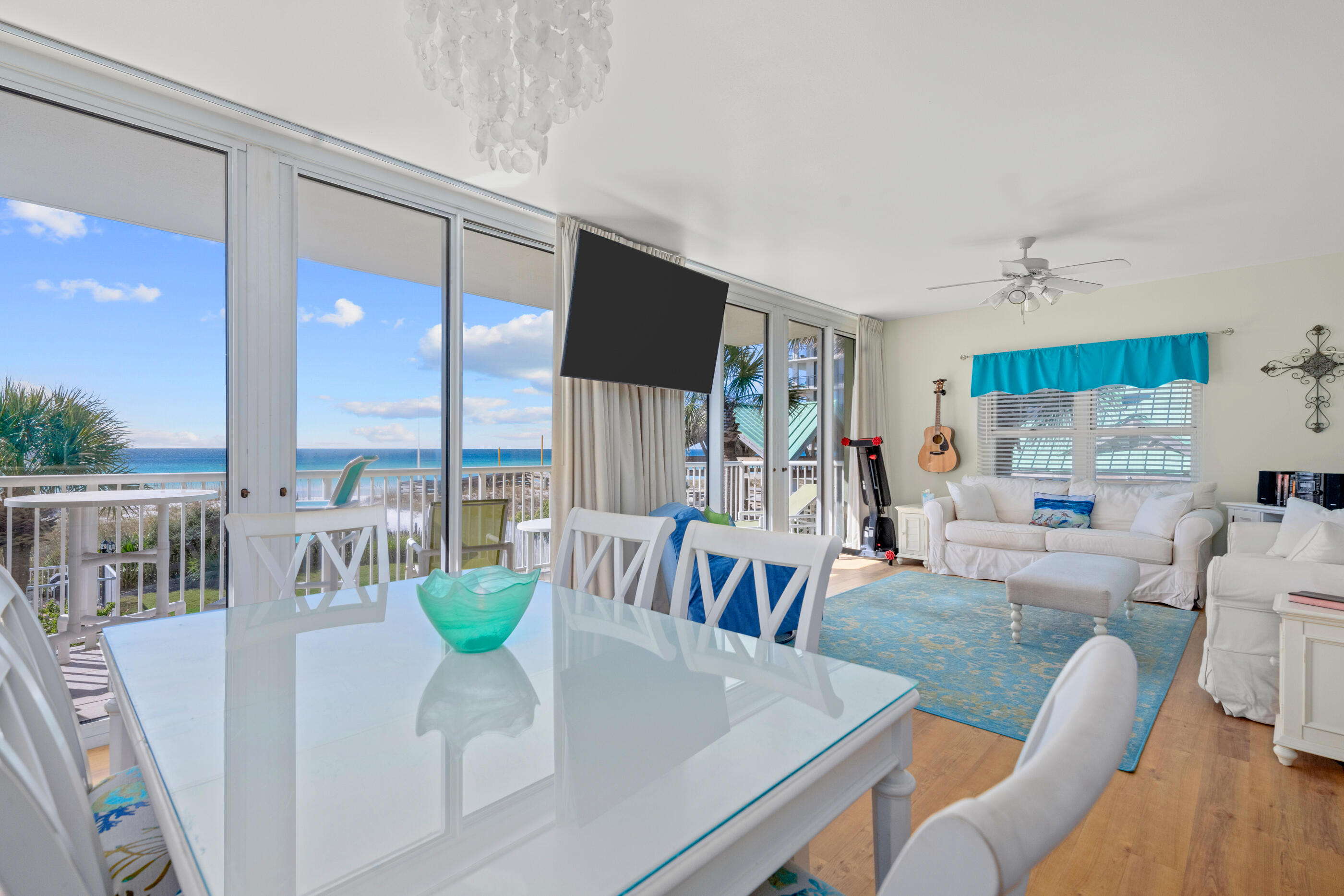 Enjoy the stunning panoramic views of the gulf from this spacious and elegant 3 bedroom, 3 bath condo. This unit features a beautiful full kitchen with granite countertops, stainless steel appliances, a large living area with floor-to-ceiling windows and sliding doors, and a generous balcony. This property is versatile and can serve as an income generating (short or long-term) investment or primary home. When fully furnished in the right configuration it can sleep up to ten guests comfortably. The unit has tile flooring and LVP throughout and is in excellent condition. The complex offers a variety of amenities, such as 5000 sq feet of gulf side pools, a fitness center, a fire pit, and easy access to the Gulf.