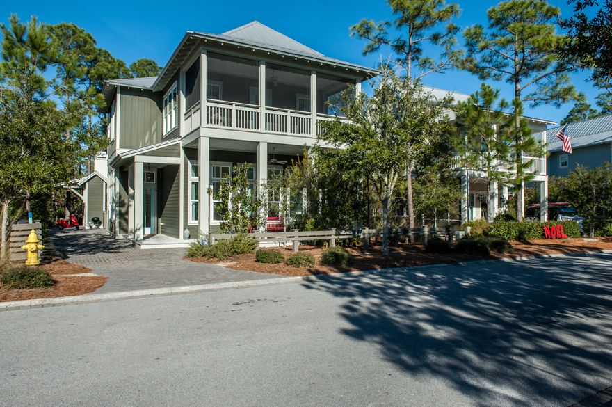 Bright and spacious Watercolor family home with a backyard oasis. Built in 2015, the last new build on Sunflower St! Never rented, well maintained, single owner home. As you walk into the home you are greeted by 12 ft. ceilings with floor to ceiling white shiplap and an open floor plan perfect for entertaining. The living room looks out back with three sets of French doors that open into serene outdoor living area featuring a fireplace, pool, and hot tub. A crisp white chef's kitchen with top-of-the-line Sub-Zero, Wolf and Asko appliances with an expansive white quartz island. Easily accessible first floor master off the entryway with a spacious bathroom, beautiful freestanding tub and a sky high walk-in Carrera marble shower...