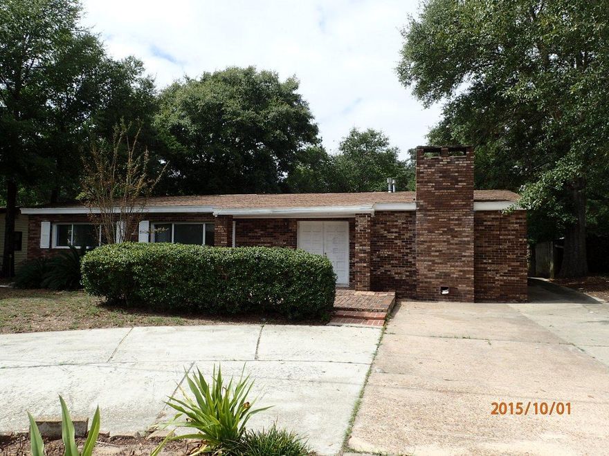 This REO property was built in 1961 and is a large home for this location! 4 bedrooms and 2 baths, this all brick home has fenced back yard and large brick fireplace. Home has seen several additions and there is a variety of different tiles inside. Home needs work and will not qualify for all financing. Call today! Bank of America, N.A. (the ''Bank'') associates and/or Bank associates, household members, HTS business partners of the Bank, are prohibited from purchasing REO properties, either owned or serviced by the Bank, whether directly or indirectly. Sellers asking price is $99,900.