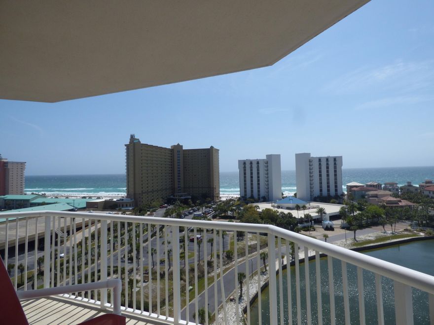 Rare offering of this Premier unit located in the 7 stack on the east side of the building. Stunning views of the gulf from a huge wrap around balcony are the best in the building. Upgrades include cabinets,granite in kitchen and all 3 bathrooms. Wet bar in the lockout unit has a microwave,small refrigerator, sink and full tub/shower. Kitchen comes equipped with upgraded refrigerator, smooth top range, microwave and dishwasher. Recently added leather sleeper sofa and chair accent the main living area with lovely 16x16 neutral tile. Over sized windows in dining/living area to the south along with the large sliding glass doors to the west bring a beautiful array of light to this beauty.It feels like the gulf is practically inside the unit. These rarely come on the market. Don't wait!