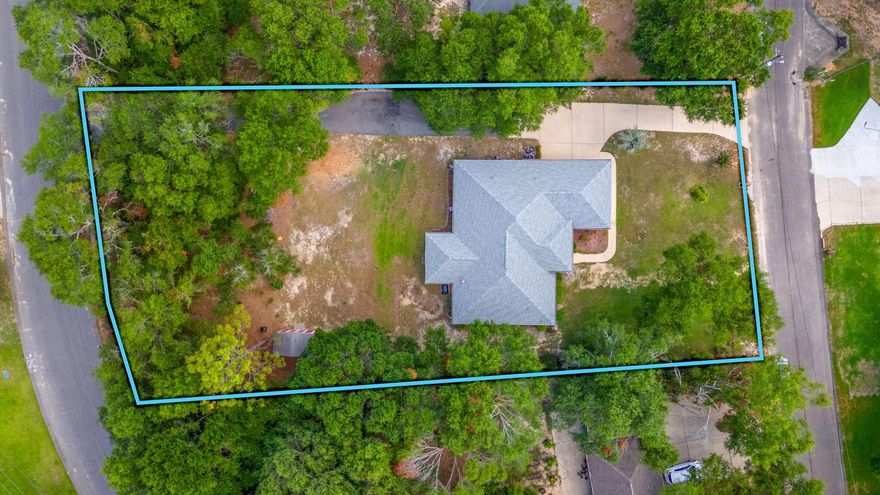 Imagine sitting on your front or back patio, sipping a cup of coffee and enjoying the beauty of your oversized lot, knowing that this home has all the big-ticket items taken care of--a newer roof (3years), new septic drain lines, and a new HVAC system. As you step inside, you'll notice the easy-to-maintain hard floors throughout, tall ceilings, and a gas fireplace, perfect for entertaining your closest guests. With multiple linen and coat closets, storage will never be an issue here.If you love to cook, this home is a dream come true! The pantry, abundant cabinets, and generous counter space make it easy to whip up the most exquisite cuisines.  After a day of culinary adventures, retreat to your huge master bedroom and bathroom that features separate areas for your tub, toilet,