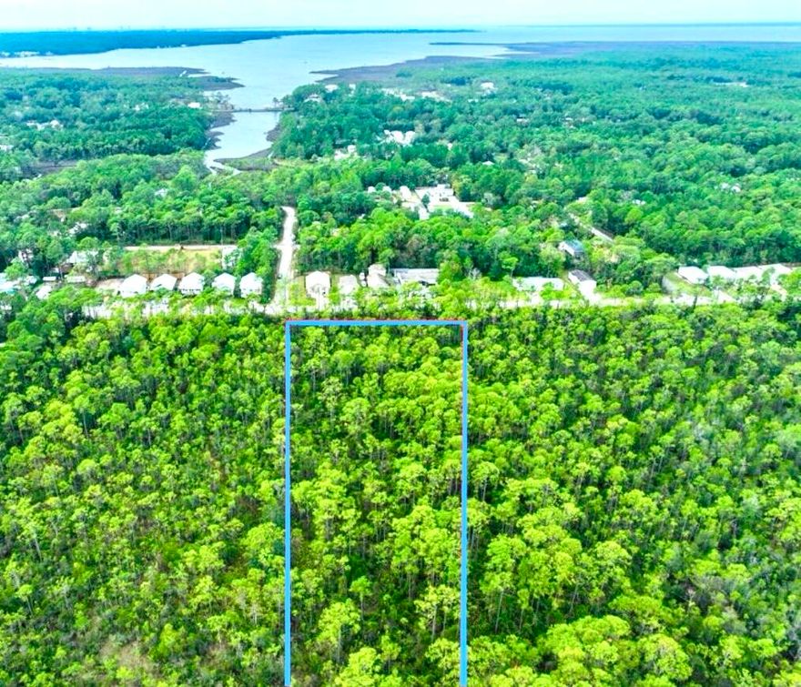 Land for Sale: Premier Development or Private Retreat Opportunity! Secure a rare 9.87-acre parcel in an EXCLUSIVE location near WORLD- CLASS beaches and Choctawhatchee Bay. Zoned for 4 homesites (1 unit/acre, approved September 2024), this property offers 3.78 acres for development. Includes 3.57 acres of preserved wetlands and approximately 1 acre in a Nokusa-owned conservation zone.
