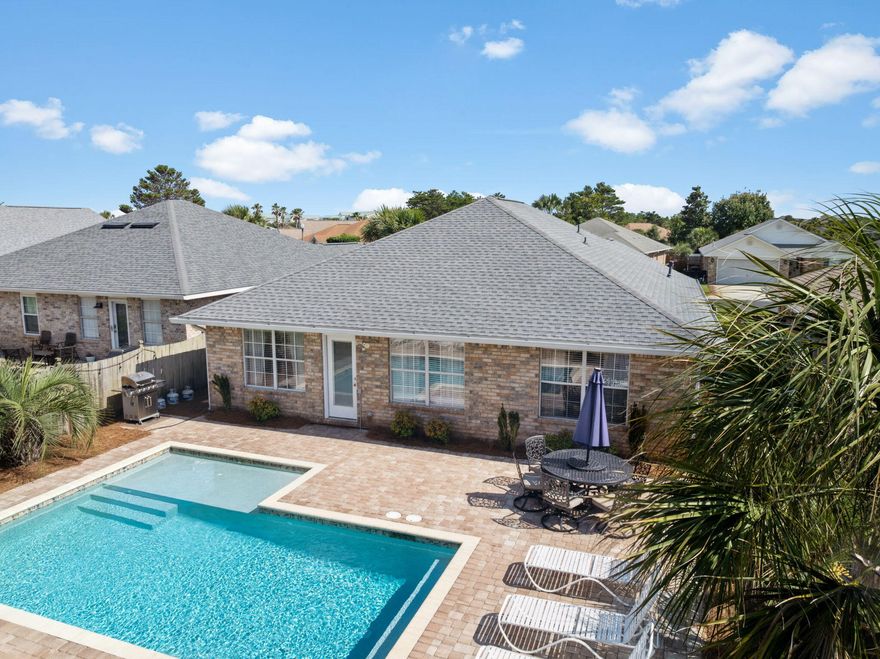 Welcome to Rustic Retreat--a proven rental powerhouse with serious income potential and charm to spare. With $126,074 in rental income for 2023 and $101,200 for 2024, plus 100 glowing five-star reviews, this fully furnished coastal gem isn't just a vacation home--it's a high-performing investment in one of the most desirable spots along the Emerald Coast.Tucked inside the gated Paradise Retreat community, this 3-bedroom, 2-bath beach home maximizes space and style across 1,586 square feet--and comfortably sleeps up to 14 guests thanks to a smart bunk room conversion. Inside, the open floor plan flows effortlessly from a remodeled kitchen to a cozy living space ideal for relaxing or entertaining. Enjoy the upgraded breakfast bar, dry bar, and a thoughtfully designed interior that blends comfort and functionality. The oversized primary suite is a standout with upgraded tile, stone finishes, and a walk-through bunk area that adds both versatility and extra sleeping capacity.
Step outside to your own private oasiscomplete with a heated saltwater pool featuring a lounging shelf and splash pad, surrounded by swaying hammocks and lush landscaping. Fire up the grill in the outdoor kitchen, or unwind with a drink in hand while the kids splash and play. There's also a garage and ample parking, making guest stays easy and convenient.
Best of all? You're less than half a mile from the beach with 320 feet of private, deeded accessplus top-rated restaurants, shopping, and entertainment just minutes away. Whether you're looking for a second home, short-term rental investment, or both, 187 Sandy Cay Dr checks all the boxes.