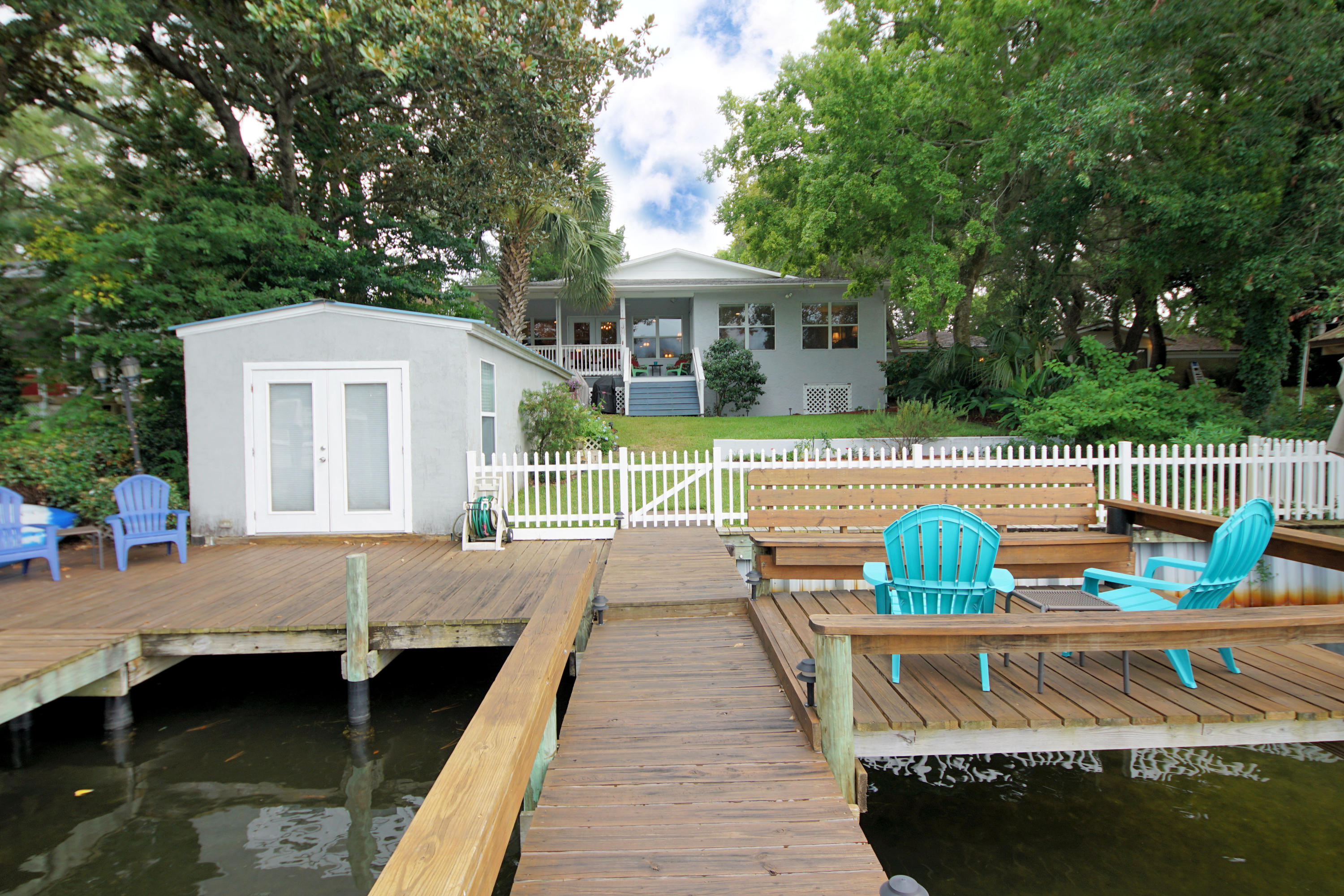 The daydream of the perfect waterfront home in Fort Walton Beach is finally a reality! A rare opportunity! Your pristine waterfront front home nestled in the cozy Cinco Bayou is waiting. Renovated 3 bedroom / 3 full bath atop a hill on the protected Kidd Bayou complete with beautiful scenery, boat slip, a boat lift and a lifetime of memories on the water! The interior of the home maximizes an open flow of living space perfect for entertaining. The master that walks onto the the peaceful backyard of Kidd Bayou is off the living room. Additional bedrooms split from the master - one bedroom contains a full bath convenient for your overnight guests! The pride of this home is evident and kept meticulous on the inside as well as the lush landscape outside. Waterfront living at it's finest!