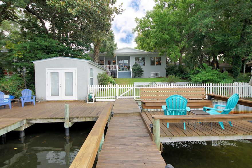 The daydream of the perfect waterfront home in Fort Walton Beach is finally a reality! A rare opportunity! Your pristine waterfront front home nestled in the cozy Cinco Bayou is waiting. Renovated 3 bedroom / 3 full bath atop a hill on the protected Kidd Bayou complete with beautiful scenery, boat slip, a boat lift and a lifetime of memories on the water! The interior of the home maximizes an open flow of living space perfect for entertaining. The master that walks onto the the peaceful backyard of Kidd Bayou is off the living room. Additional bedrooms split from the master - one bedroom contains a full bath convenient for your overnight guests! The pride of this home is evident and kept meticulous on the inside as well as the lush landscape outside. Waterfront living at it's finest!