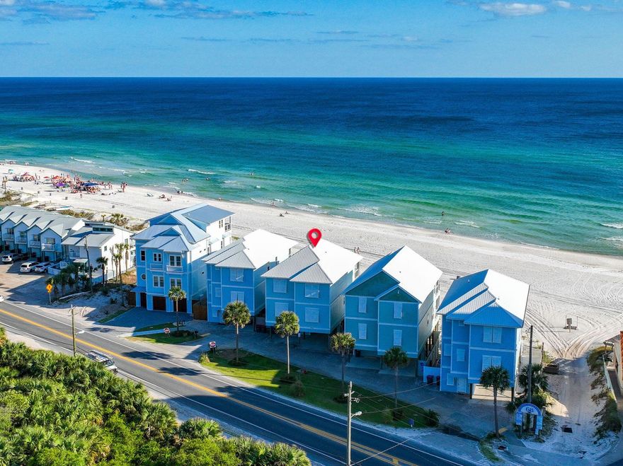 This exquisite Gulf-front home with 50 feet of beach frontage on the West end of Panama City Beach is designed to the highest standards, offering unparalleled luxury. With 6 bedrooms, 6 full baths, and 2 half baths, this stunning property serves as the ultimate family retreat or an exceptional investment opportunity, with rental projections exceeding $250K.The home boasts a 16' x 8' beachfront pool, encased in glass screening for unobstructed views of the sparkling Gulf. The expansive outdoor space includes a pool deck with a built-in grilling area and a shaded cabana, providing the perfect setting for both sun-seekers and those desiring a cooler escape... Inside, the main living area on the second level features an open-concept design, seamlessly blending the living room, dining room, and a chef-inspired kitchen with an impressive 11' bar. This level also includes 2 guest bedrooms and baths, as well as a second powder room. Ascend to the third level, where you'll find two luxurious Gulf-front master suites, each with direct access to the Gulf-front porch, as well as two additional guest suites.

The interiors exude coastal charm with soft greys and classic whites, complemented by wood-look tile flooring throughout. The stairwell is beautifully enhanced with tiled wainscoting, elevating the home's sophisticated aesthetic. Built to endure with 150 MPH impact windows and doors, a metal roof, and durable concrete board siding, this home is designed for both beauty and resilience.

Fully furnished and rental-ready, this property offers the perfect blend of luxury and convenience.

*All info deemed correct but must be verified by buyer*