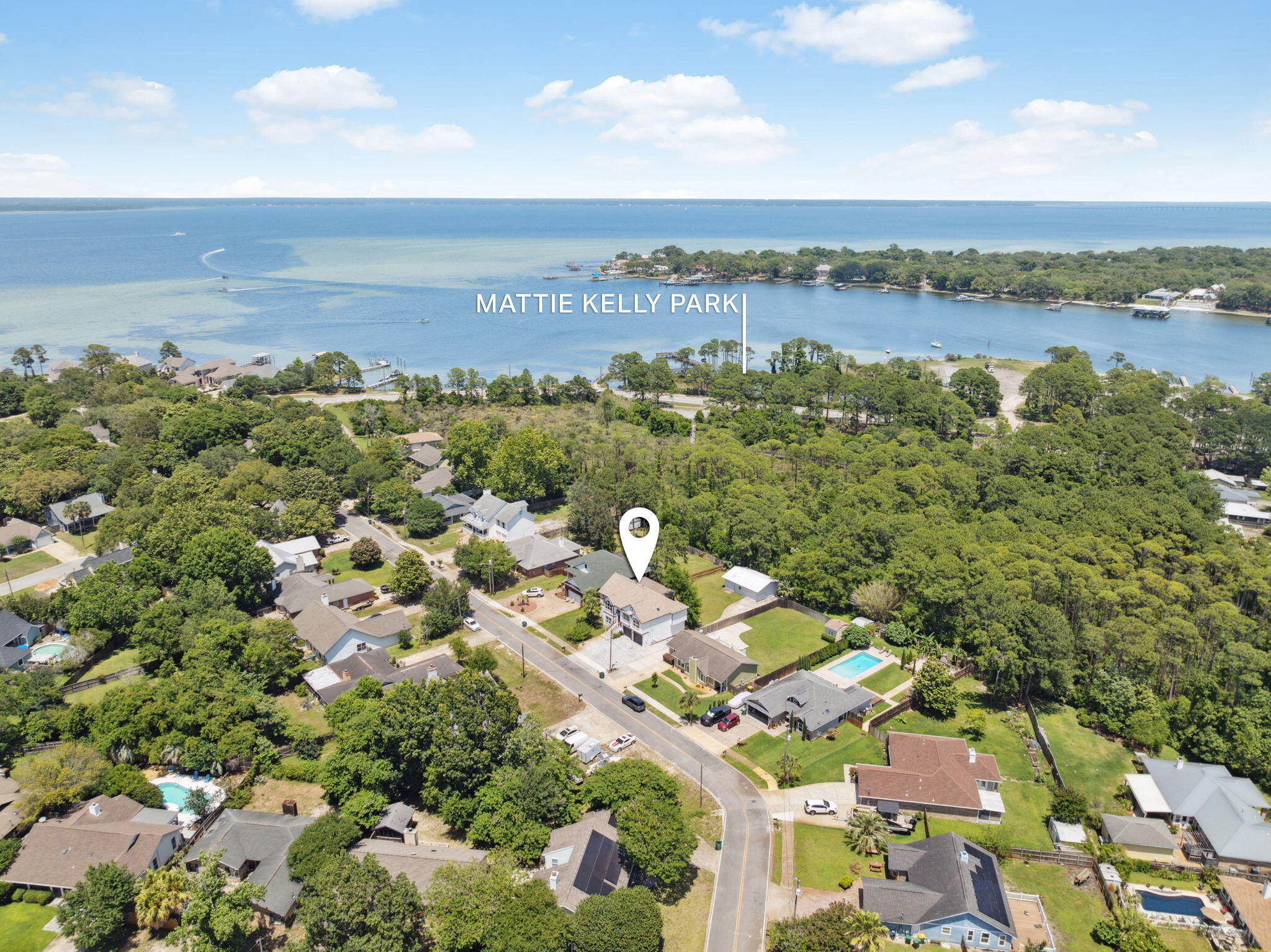 INVESTOR ALERT-RENTED AT $4,687K/MONTH- INCOME PRODUCING PROPERTYTucked away in a quiet cul-de-sac in the heart of Old Destin, 1190 Bay Court is a beautifully remodeled 5-bedroom, 4-bath home that offers over 3,000 square feet of versatile living space and backs directly to the scenic Mattie Kelly Nature Preserve and park. With no HOA dues and just a stone's throw from the Bay and Joe's Bayou public dock, the location blends privacy and accessibility. Enjoy being only two miles from HarborWalk Village's restaurants, shops, and entertainment--and a quick drive to multiple beach access points, including Snorkel Beach (5 mins) and Henderson or Beasley Park (10 mins). Designed for flexibility, this two-story home offers two complete living areas each with a full kitchen, laundry, HVAC, water heater, and private entrances.
Upstairs features 3 bedrooms and 2 baths, vaulted 14-foot ceilings, and an open-concept layout filled with natural light. A cozy loft with bay views makes the perfect home office or yoga retreat. Downstairs includes 2 additional bedrooms and 2 baths, fully wheelchair accessible, making it ideal for multigenerational living or a separate rental opportunity.
The list of upgrades is extensive: new flooring, cabinetry, countertops, lighting, fresh paint, and recent 2024 improvements including a brand-new roof, new irrigation pump (well system), 100 amp panel in the barn, and a 50-amp Tesla-ready circuit in the garage. A full home inspection from March 2024 is available upon request.
Step outside to a spacious backyard with room for a pool, garden, and detached workshop. Whether you're entertaining, investing, or simply looking for space to spread out, this home delivers comfort, convenience, and potential- all just minutes from the best of Destin.
Homes like this do not come along very often! A must see.