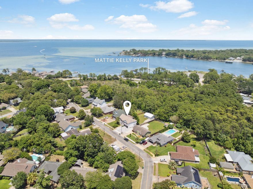 INVESTOR ALERT-RENTED AT $4,687K/MONTH- INCOME PRODUCING PROPERTYTucked away in a quiet cul-de-sac in the heart of Old Destin, 1190 Bay Court is a beautifully remodeled 5-bedroom, 4-bath home that offers over 3,000 square feet of versatile living space and backs directly to the scenic Mattie Kelly Nature Preserve and park. With no HOA dues and just a stone's throw from the Bay and Joe's Bayou public dock, the location blends privacy and accessibility. Enjoy being only two miles from HarborWalk Village's restaurants, shops, and entertainment--and a quick drive to multiple beach access points, including Snorkel Beach (5 mins) and Henderson or Beasley Park (10 mins). Designed for flexibility, this two-story home offers two complete living areas each with a full kitchen, laundry, HVAC, water heater, and private entrances.
Upstairs features 3 bedrooms and 2 baths, vaulted 14-foot ceilings, and an open-concept layout filled with natural light. A cozy loft with bay views makes the perfect home office or yoga retreat. Downstairs includes 2 additional bedrooms and 2 baths, fully wheelchair accessible, making it ideal for multigenerational living or a separate rental opportunity.

The list of upgrades is extensive: new flooring, cabinetry, countertops, lighting, fresh paint, and recent 2024 improvements including a brand-new roof, new irrigation pump (well system), 100 amp panel in the barn, and a 50-amp Tesla-ready circuit in the garage. A full home inspection from March 2024 is available upon request.

Step outside to a spacious backyard with room for a pool, garden, and detached workshop. Whether you're entertaining, investing, or simply looking for space to spread out, this home delivers comfort, convenience, and potential- all just minutes from the best of Destin. 
Homes like this do not come along very often! A must see. 