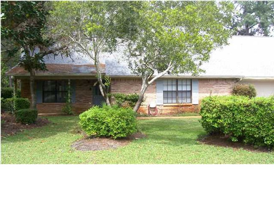 Settle into this charming 4bd/2.5ba home within the desirable Bluewater Bay community. Tall ceilings and a log burning fireplace add space and comfort to the inviting living area. Primary bedroom favorably located on the main floor extends to the primary bath which shows off the large garden tub and vanity. Upstairs is complete with three bedrooms and a full bath. Plenty of outdoor space for recreation, entertaining, or just enjoying the Florida sun await you in the lush landscape of this property!