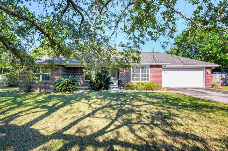 Back on market. No fault of the seller. This home has so much to offer! Come out and see this well maintained all brick 3 bedroom 2 bathroom home on 0.96 acres. Located in North Crestview, this home has a spacious, open, split floor plan, complete with vaulted ceilings, 2 car garage, covered patio, fire pit, fenced yard and outside storage. This property would make the PERFECT family home! Super easy commute to bases, beaches, schools, shopping, and more.
