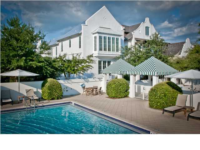 NEW CONSTRUCTION - the BEST FEATURES OF NEW ORLEANS STYLE COURTYARD ENTRY from the Boardwalk AND EASY BEACH LIVING where the indoor and outdoor spaces merge & flow one into the other with a design by the renowned architectural firm, Domin/Bock. An ultimate Beach House for lazy days by your private Courtyard pool or stroll out of the secluded garden through the arched gate to Rosemary Beach's Cabana Pool. Level 1 of the Main House enjoys an open Living/Dining/Kitchen with 12' ceilings and timber beams. This level extends directly onto the spacious Courtyard accented by the pool with a falling water feature and an outdoor kitchen. Level 1 also host a Guest Bedroom, Full Bath and Laundry. Level 2 host the Master Bedroom with en suite bath, a bunk room and bath plus an additional bedroom