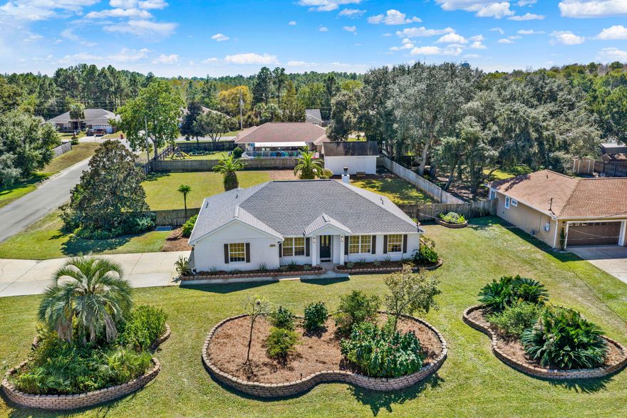 New, New, and More New! This  renovated corner-lot home in Holley by the Sea is fully updated and move-in ready. Highlights include a brand-new roof, new kitchen with quartz countertops, new cabinets, appliances, fixtures, and lighting. HVAC (2023).  New window glass, plumbing fixtures, LVP flooring, and carpeted bedrooms.  Fresh paint inside & out extends to the 14'x24' backyard shop. The large backyard with new sod has room for a pool, garden, or play area. Enjoy Holley by the Sea's 48 acres of amenities--3 pools, gym, tennis & basketball courts, baseball fields, boat ramp & MUCH MORE. Just minutes from Navarre Beach, Pensacola Beach, and nearby bases. Open House: Saturday 10/18, 11 AM-2 PM.