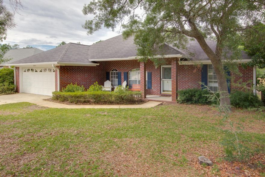 Charming all brick 3/2 home on quiet street just waiting for you to call it home. From the moment you walk up--the curb appeal is evident. This lovely red brick home with an oversized front porch home sits on almost a half acre lot that backs up to a creek and greenbelt. Featuring a split floorplan with a large living room with vaulted ceilings in the center. The living room has a fireplace and is adjacent to both the dining nook and open dining room. Your galley style kitchen features lots of storage space between the cabinets and pantry. A lovely kitchen nook with a bay window overlooks your huge backyard! Your large master bedroom has a nice sized master bathroom with his and her sinks and walk in closets plus a separate garden tub & shower.
