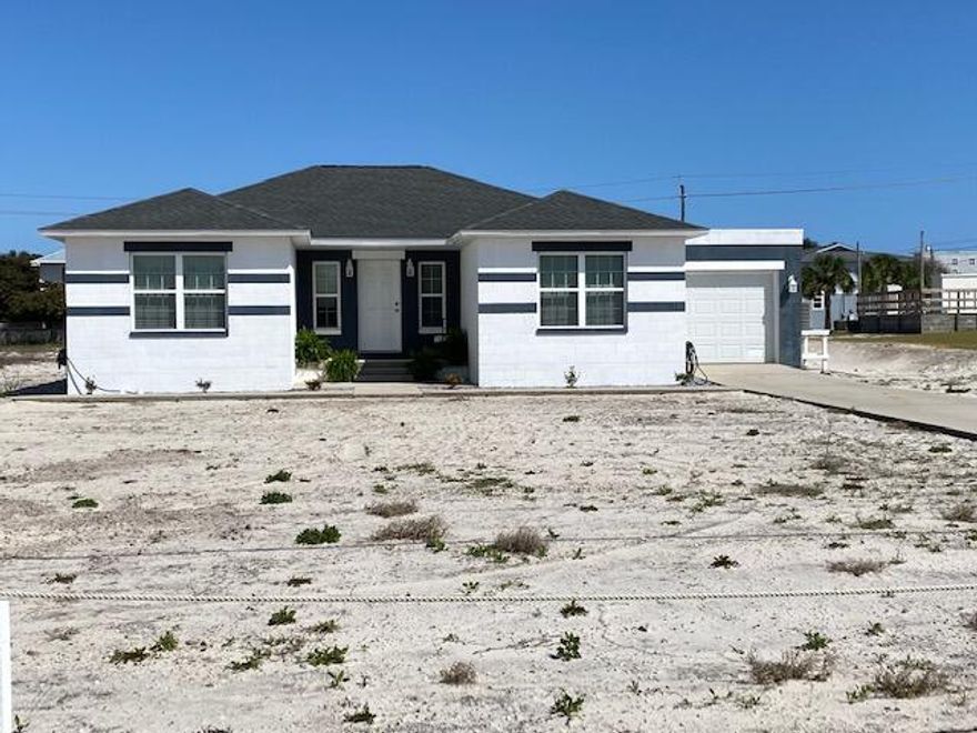 Always Dreamed of Living at the Beach? This is Your Island Home! Single Story with Room for a Deck Over the Garage! This Would Add Loads of Outdoor Living Space and Gulf Views (architect drawings available)! Beach Access Directly Across the Street and County Easement at the Back of Yard! These Water Views Should Never Go Away! This is a Solid Block Home With Finishing Touches Just Completed. Cute Little Front Porch Greets You. Tile Floors Throughout for Easy Maintenance. 2 Bedrooms Located at Each Side of the Front with the Master Bedroom at the Back - Sound Views from the Master! Spa-Like Master Shower! Loads of Natural Sunlight! New Quartz Counter Tops! Subway Tile Back Splash! No Short Term Rentals! Buyer to verify measurements