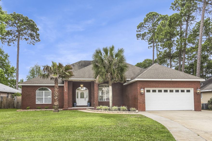 Custom built home in a great neighborhood!! Beautiful home, located across the street from the bay and only 5 houses down from the neighborhood, waterfront pool and pier. This home is in a great location with the privacy and quiet streets, with the best neighbors around,. Built by Ray Hall Custom Homes and lives large to be perfect for a permanent residence and or a great way to step into Bay living. Spacious fenced in back yard with an open floor plan. Split floor plan with master suite on one side and the other three on the opposite side. One of which could make a perfect office or flex space. Large kitchen with stainless steel appliances, tile floors, screened in back porch with great curb appeal. Come check out this lovely home located in Miramar Beach.