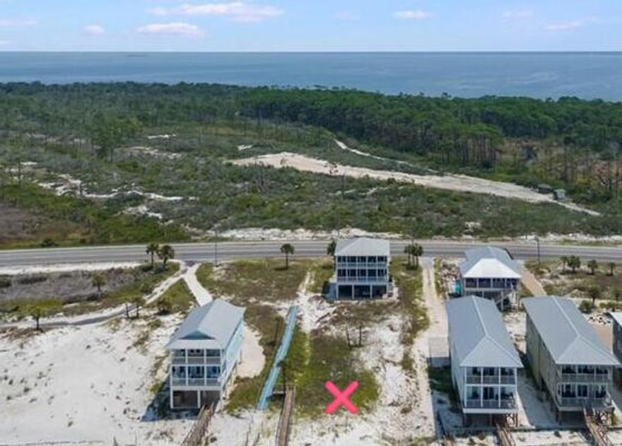 Nothing better than owning a .322 ac BEACH FRONT property on the white Sandy beaches of  Northwest Florida in 'The Constitution City' Port St. Joe . Enjoy a relaxed vibe in this historic town with fishing, kayaking, paddleboarding, nature trails, camping, and other nature destinations such as Joseph Peninsula State park. Pets are welcome on the beaches except for St. Joseph Peninsula State Park, William J 'Billy Joe' Rish Recreation Area and Eglin Airforce Base property on the elbow of Cape San Blas. AE flood Zone . Water is provided by Gulf County Water dept. and  Sewer is provided by City of Port St Joe . Tap fees due. The schools are  Port Joe Elementary School and  Port Joe High School. See photos for all pertinent information such as Dimensions, zoning, flood map, etc Gulf County does not have zoning districts; they operate under land use designations. The land use is MCR (Mixed Commercial/Residential). This allows for either a single-family dwelling or a commercial business to be built on the parcel (one or the other, not both). the 5-foot pedestrian beach access easement, it is a legitimate and recorded pedestrian easement. The boardwalk/dock would convey . The boardwalk is not tied to the pedestrian easement or designated for public use. From the County's perspective, the lot is considered buildable; however, final determination would fall under DEP jurisdiction. Setbacks 25' f,  7.5' s or 9.5' depending on the height of the structure, R 50' from the mean high water line 