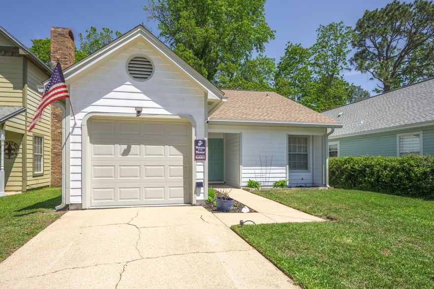 Welcome to 2527 Georgetown Lane in Fort Walton Beach, FL. Ideally located for active duty or DOD personnel, this home offers easy access to both Eglin AFB and Hurlburt Field. The Northwest Florida State College FWB campus is just under 1.5 miles away, and HCA Fort Walton Beach Hospital is within a 2.5-mile radius. Enjoy nearby amenities such as Kohl's, Aldi, Lowe's, Walmart, and Sam's Club, all within a short 5-10-minute drive. Plus, a new Starbucks, Culver's, and McDonald's are set to enhance your dining options.This charming home features a new roof installed in January 2023 and a privacy fence replaced in September 2024. Nestled on a quiet cul-de-sac, the property boasts a covered front porch, a single-car garage, and rain gutters. Inside, the open floorplan is accentuated by LVP flooring throughout and a cathedral ceiling. The kitchen has granite countertops, open shelving, a modern white subway tile backsplash, stainless-steel appliances and a cozy dinette space bathed in natural light from expansive windows.
The master bedroom offers double closets for ample storage, and remote ceiling fans are installed in the bedrooms and living room. French doors open to the back patio, providing a perfect space for relaxation or entertaining. Don't miss out and schedule your private showing today!