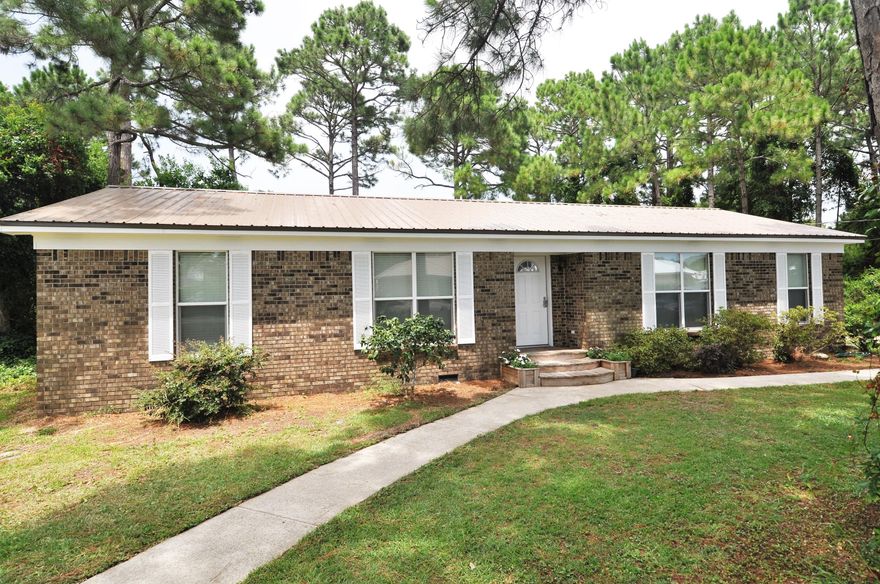 This home is perfect for a new or small family whether its their first home or if downsizing. All brick and completely remodeled throughout. New floors, bathrooms, kitchen, appliances, tankless water heater, and metal roof. Spacious closets and bathrooms with open dining and living area. Large master bedroom and closet. The garage is detached in back with plenty of space in back for a boat and/or trailer.