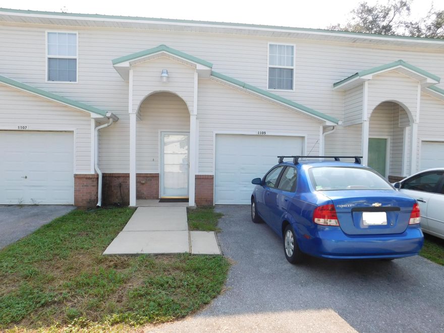 Pride of ownership shows throughout this 2 bedroom/2.5 Bath townhouse style condo with 1 car garage located in central Fort Walton Beach. Move in ready with many thoughtful upgrades completed over the time the seller has lived there. Wood Laminate floors and tile throughout, and wood stairs there is no carpet here! Spacious living area with beautiful tile flooring and a french door with built-in mini blinds leading out to the open deck and backyard. The kitchen opens into the living area with lots of counter space, plenty of cabinets, and an island with a breakfast bar. 1/2 bath is located downstairs and 2 master suites upstairs both with walk in closets, 1 bathroom with a tub/shower combo and the other with a custom oversized tiled shower. Your new home awaits!