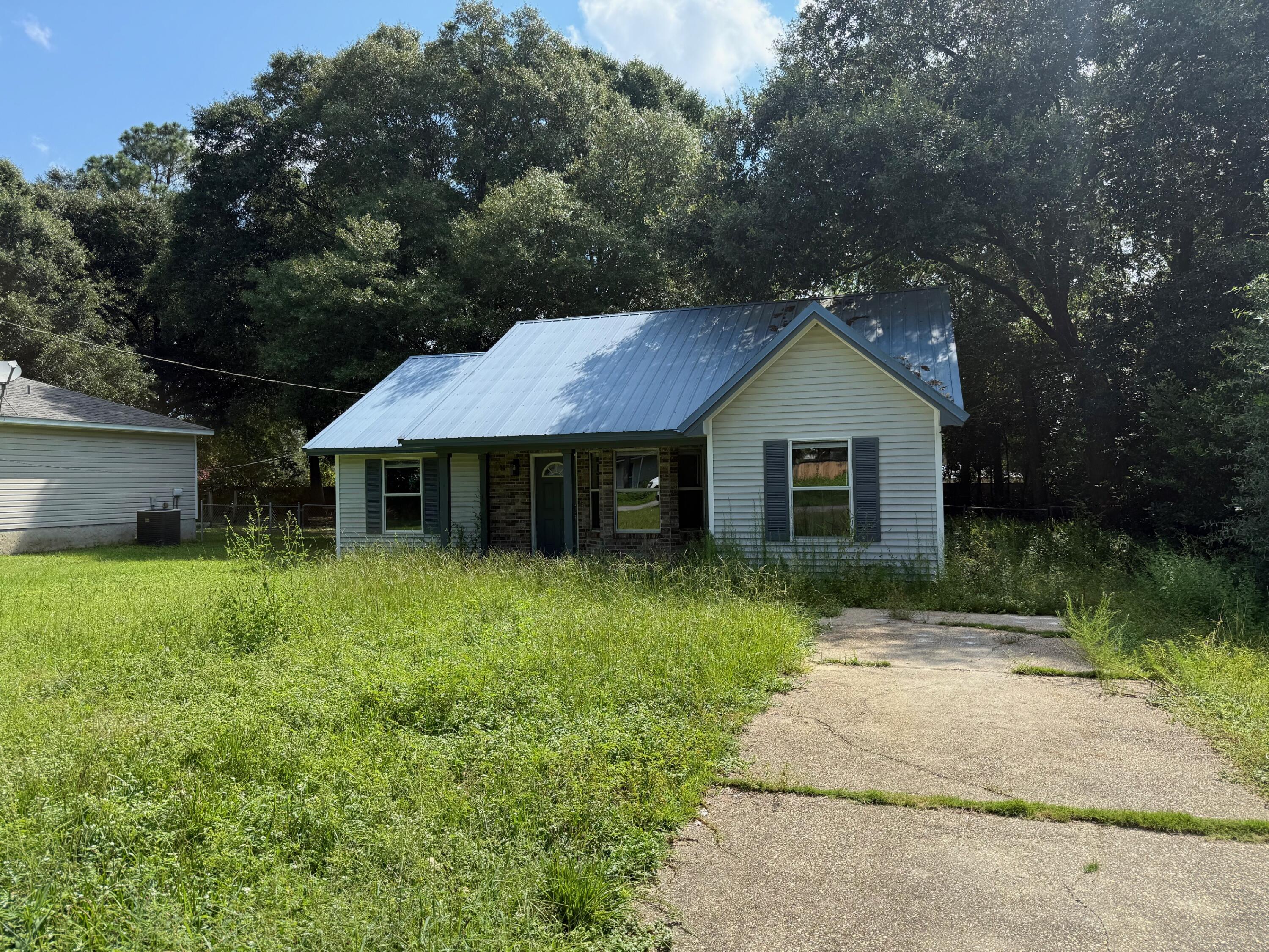Move in ready home in quiet and peaceful area with no HOA. Property has been updated a few years back. Buyer to verify all pertinent information including sq. footage and lot dimensions. Property is being sold strictly AS IS.