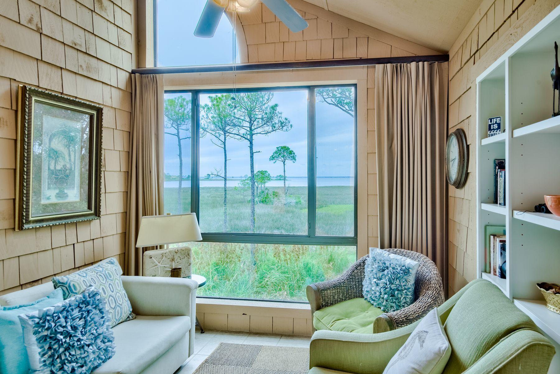 For those with beach, golf and resort dreams with spectacular views of the sunsets, Choctawhatchee Bay, and Baytowne Marina, this condo may be the one for you! Spacious floor plan with a livable layout and plenty of storage. Vaulted ceilings with sky lights in the family room create a light and open space. The Master suite and sizable guest bedroom are separated by the living area and each have their own bathroom and walk-in closet. Your association dues include exterior maintenance and insurance, two community pools, daily trash collection, basic cable, deeded beach access, security gates, and more! Conveniently located close to the main entrance of the resort, you're a quick golf cart or bike ride to all the amenities that resort life has to offer including the SOA pool with lap lanes.