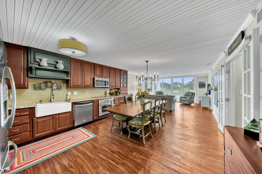 This has never been on a rental program, it is in pristine condition.  Private washer and dryer in the unit.  Completely renovated unit down to the electrical.  Turnkey unit in the desirable 'B' building.  this unit is an end unit with extra windows for extra views all the way down the harbor.  Unit has two exterior storage units and the project has a private pool as well as a clubhouse, tennis courts, a dock and access to the beach is literally just down the street.  This unit has an  amazing kitchen with a farm sink and a wine cooler.  Lots of extra built in storage, it shows really well.  Buyer to verify all dimensions and square footage.