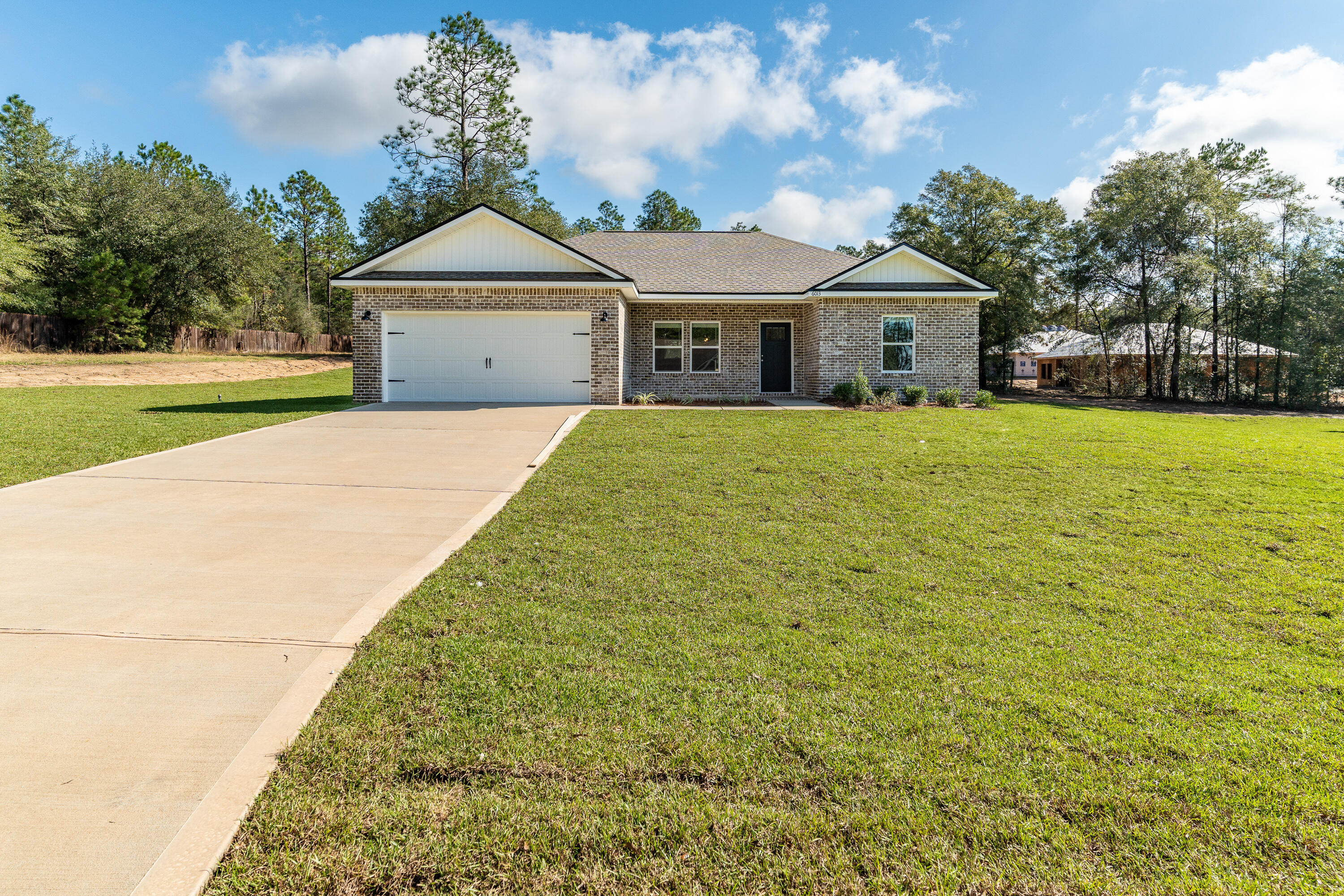 NEW YEAR - NEW HOME - READY JANUARY 2025 - All brick with craftsman style touches, fully landscaped yard with backyard privacy fence and sprinkler system.  Inside you have an open plan with raised ceilings, Luxury Vinyl Plank flooring throughout, quartz or granite countertops.  Kitchen features work island, dining area, pantry, stainless steel appliances, owner's bath has tiled shower, double vanities and walk-in closet.  Laundry room and 2-car garage with pull down stairs for attic access.  Seller may contribute up to $10,000 towards buyers closing costs and/or prepaids and/or rate buydown - restrictions apply - call for details.  Photos of similar completed home front elevation and colors will vary.