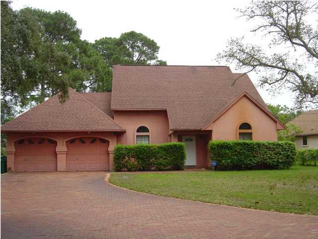 Bay views from large wooded lot. Across the street from Ft. Benning. Large open floor plan, offering master down stairs, and additional bedrooms upstairs, large lot screened in back porch.