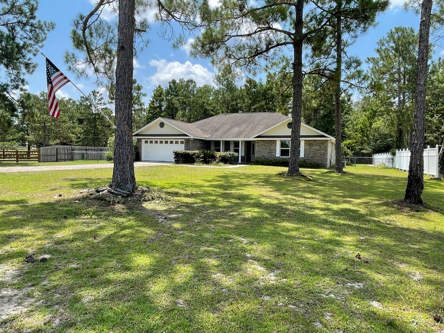 Remarkable 4 bedroom brick home located in one of the nicest subdivisions in the area. Beautiful view from the front of the home to the lake across the street. Large yard with the back fenced in for pets or young children. There is a concrete sidewalk around the perimeter of the back yard that could be used for walking or kids to skate, ride bikes, etc. Home has been newly painted and awaits your personal touches to bring it to life. The master suite on the one side and all 3 additional bedrooms and hall bath on the other allowing for privacy. Spacious bedrooms with really large closets. Open floor plan makes it perfect for entertaining. Take a look today and lets get you in your new home before Summer!