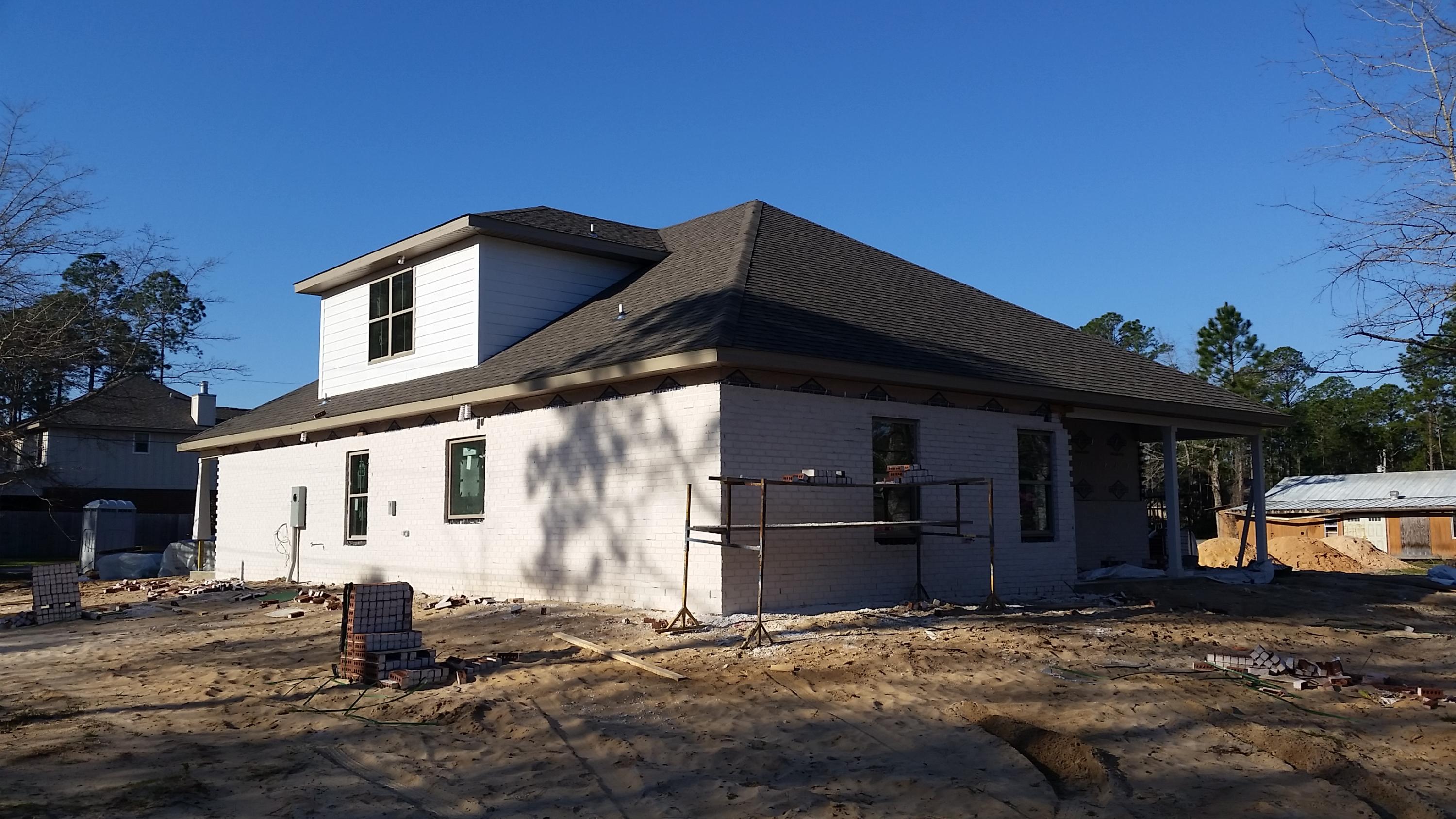 New Home In Santa Rosa Beach. Home Is At The Beginning Of Harstvedt Plantation But Not In The Community Itself. Therefore No HOA Fees. Just Down The Road Is A Bay Front Public Park. Home Has An Open Floor Plan, Kitchen With Granite Counters and Stainless Appliances. Large Master Bedroom With Walk In Closet, Two Additional Large Bedrooms, And A Second Full Bathroom. There Is A Fourth Bedroom With Third Full Bathroom Upstairs. Many Nice Features In This Home. All Dimensions Are Approximate And Subject To Change. (Some Photo's Are Of A Similar Home To Show Detail).