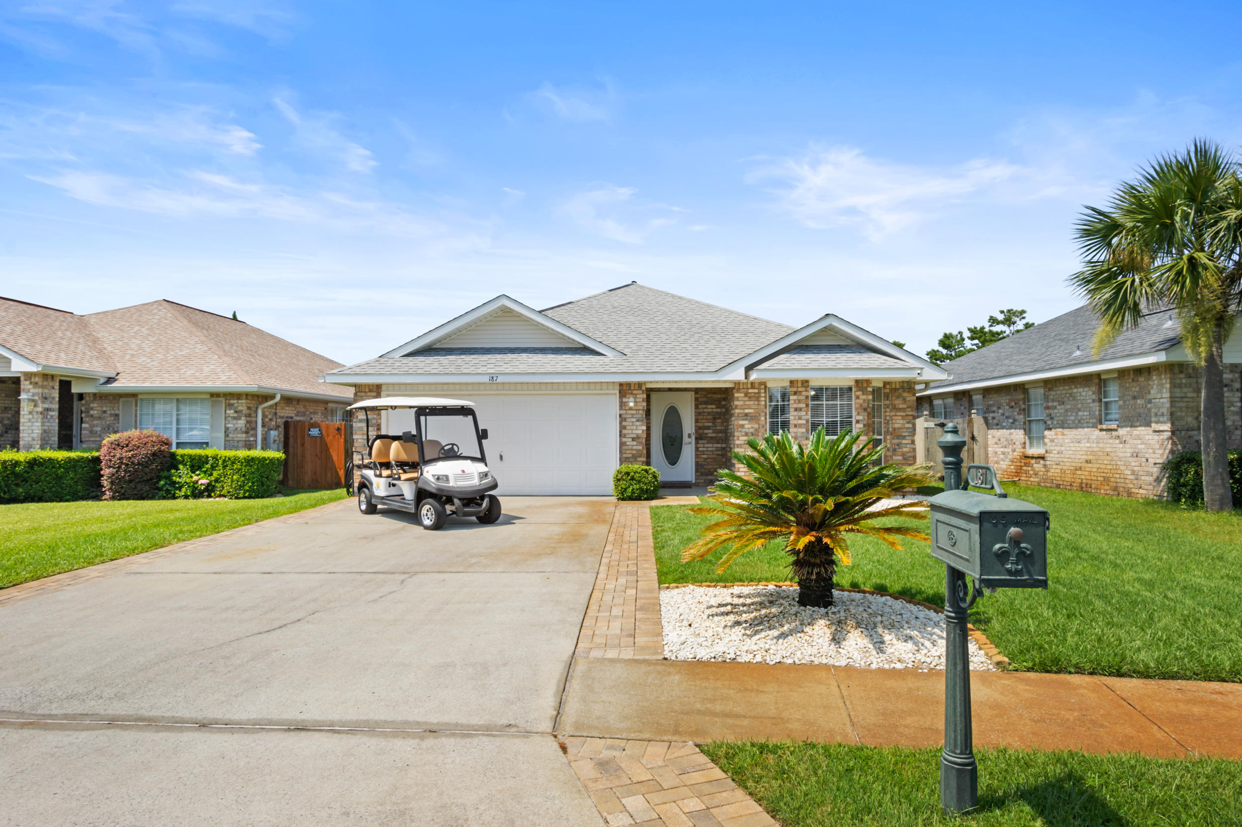 Primely positioned less than a half-mile to the beach, 187 Sandy Cay Dr. is tucked away in the highly-desirable gated beach community of Paradise Retreat.  Aptly named the Rustic Retreat, this beautiful brick home offers incredible rental returns, with over $105k in base rental rate already booked for 2021, and 9 weeks booked for 2022.  Completely renovated and turnkey, this 3 bedroom, 2 bath home offers pristine finishes enveloped by an inviting floor plan, and is sold fully furnished and decorated.  Extensive upgrades include new paint, new bunk room, all new furniture/decor, new private pool and entire outdoor landscaping/hardscaping, and a complete kitchen remodel with breakfast bar and dry bar.