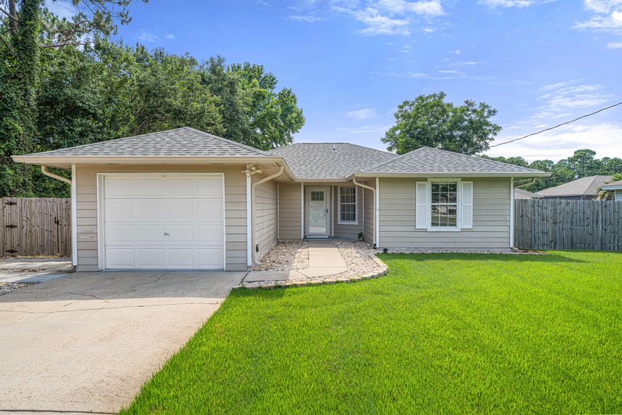Totally remodeled and just minutes to the front gate of Hurlburt Field and only a 30 minute drive to Eglin AFB. This gem is a perfect primary residence, second home, or investment property! Have peace of mind with a roof just replaced November 2022, new HVAC in 2019, and a water heater replaced December 2018. Pull up to this adorable west Mary Esther home and walk inside to find a beautifully updated home. Wood look tile floors greet you and extend through all the common areas and a vaulted ceiling in the spacious living room adds to the fantastic open floor plan. You'll love this kitchen with granite countertops and room for bar stools and a breakfast nook, soft close white shaker style cabinets, separate pantry, and stainless steel appliances including a low profile microwave and a smar smart fridge! Primary suite on the back of the home overlooking the beautiful yard. Great layout with 3 bedrooms, 2 bathrooms and a 1 car garage! Washer and dryer included too. Lots of updates outside too! Extended driveway with room for an RV, boat or just extra parking. In the back there is a new screen porch that adds a great space for bird watching, enjoying the breezes and entertaining. Beautifully landscaped yard. Home has been treated quarterly for pests and has termite bait stations. This home has all the upgrades at a great price! Move in ready and must see asap!