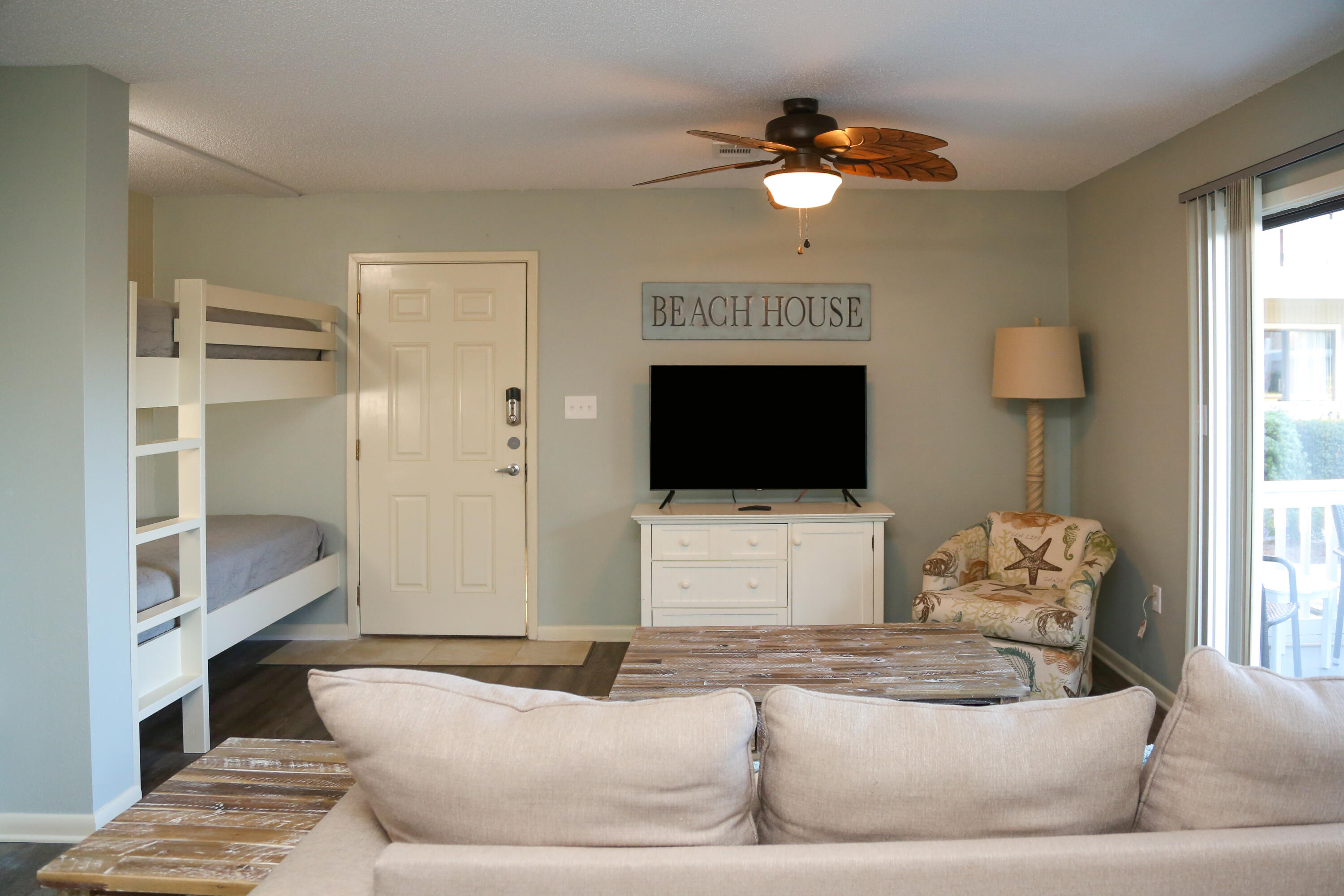Welcome to 30Yay! This beautiful 1 BR \ 1 BA condo with custom built-in bunks is located at at Beachwood Villas. Being sold fully furnished and rental ready. Located in the heart of Seagrove Beach, you can park your car and head to the beach or enjoy many of the great restaurants in Seagrove, Seaside and the new Greenway Station. As you enter this ground floor condo, you'll be greeted by a bright and airy living space, featuring an open floor plan that seamlessly connects the living, dining, and kitchen areas. The cozy living room invites you to unwind and enjoy your favorite book or watch a movie on the flat-screen TV after a day spent on the beach. Adjacent to the living area, the dining space comfortably accommodates four, perfect for enjoying meals with loved ones.