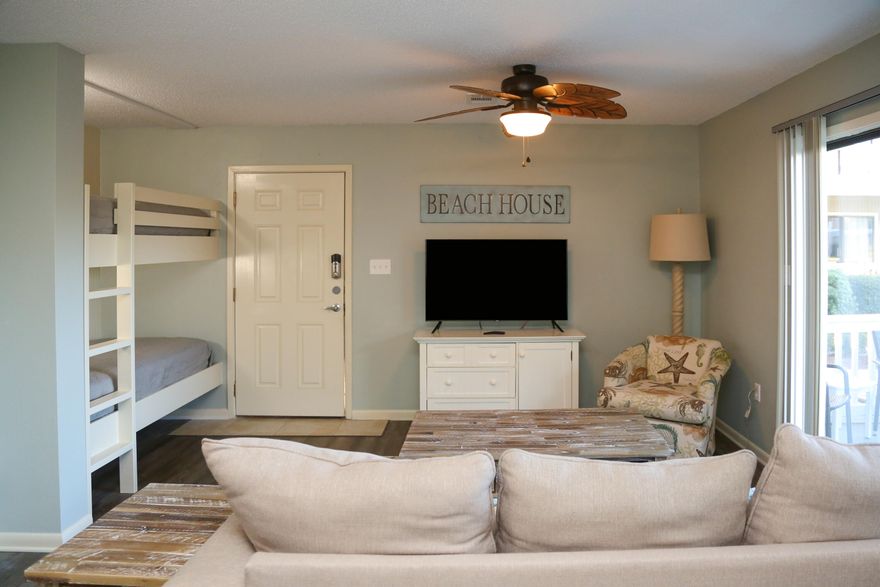 Welcome to 30Yay! This beautiful 1 BR \ 1 BA condo with custom built-in bunks  is located at at Beachwood Villas. Being sold fully furnished and rental ready.  Located in the heart of Seagrove Beach, you can park your car and head to the beach or enjoy many of the great restaurants in Seagrove, Seaside and the new Greenway Station. As you enter this ground floor condo,  you'll be greeted by a bright and airy living space, featuring an open floor plan that seamlessly connects the living, dining, and kitchen areas. The cozy living room invites you to unwind and enjoy your favorite book or watch a movie on the flat-screen TV after a day spent on the beach. Adjacent to the living area, the dining space comfortably accommodates four, perfect for enjoying meals with loved ones.