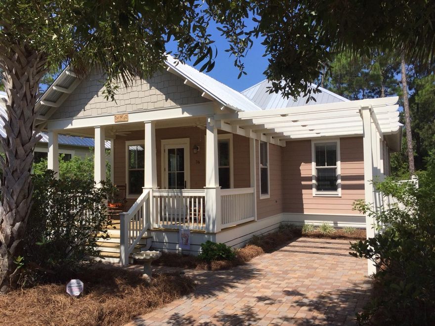Welcome to the Cottages at Eastern Lake now featuring this immaculate 3 bedrm/2 bath FULLY FURNISHED Florida Cottage that is turn key ready! Step into this Southern coastal cottage with all of the charm that defines the relaxing mood and lifestyle that we all come to appreciate here in Santa Rosa Beach. The Kitchen boasts white solid wood cabinetry with granite counter tops and all matching stainless appliances. The floor finishes are natural travertine stone throughout all common and wet areas with frieze carpet in the bedrooms. The master bedroom has a trey ceiling with hidden lighting accents, a walk-in closet, along with an en suite bath that includes a soothing jet spa tub with ceramic tile surrounds. Many more amenities & only a 5 minute walk to the beach make this a must have home!
