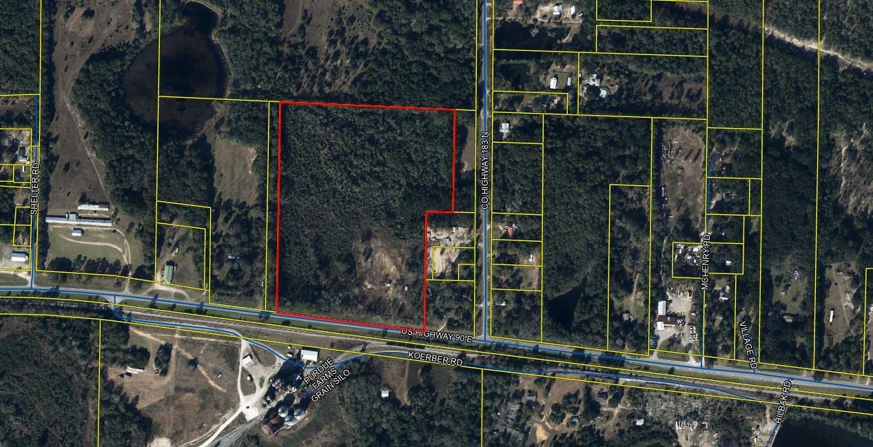 28.41 acres just east of DeFuniak Springs zoned Rural Village in Flood Zone X. Frontage on Hwy 90 East appx. 900'. Good location for horses and other animals. Was once used for a 4-H arena. Block structure was once public bathrooms for the club. Seller does not know the location of the septic or that there is one on the property.Power pole with no box. Property has an Argyle Water Dept. water tap, Seller has never lived on the property and has added no value for the improvements.