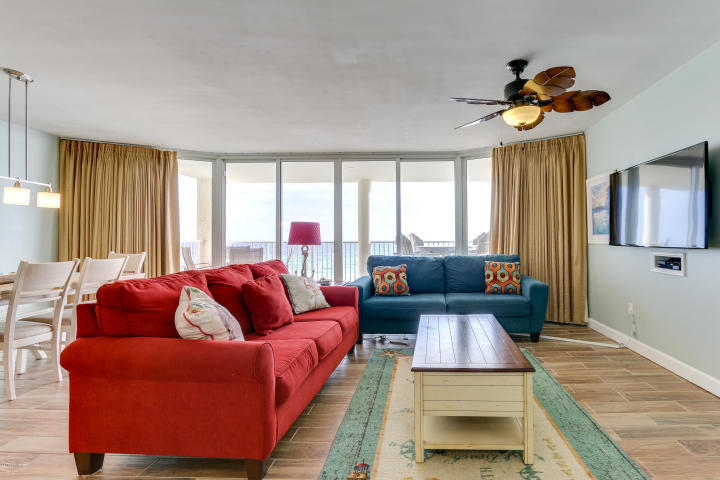 This beautiful 1304 square foot, extensively upgraded, 5th floor, 2bed/2bath condo is considered by many to be the best 2bed floor-plan on the beach! Property enjoys floor-to-ceiling views of the Gulf from both bedrooms and great room that steps out to the large private balcony. Extensively remodeled and meticulously maintained. Conveys fully-furnished, turnkey, and rental ready. Custom tiled floors means easy clean-up and ultra-low maintenance. Granite, shaker cabinets, and Stainless Steel in the kitchen! Both master bedrooms are gulf front and have access to the enormous main balcony. Both also have en suite baths that feature new stained maple cabinets, custom showers, and double vanities. Separate spacious laundry room with washer and dryer provides plenty of extra storage room