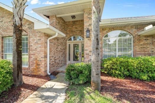 What defines a home? A home is more than just a structure--it's where love is nurtured, laughter is shared, and lifelong memories are made. It's the backdrop for holiday traditions, quiet morning coffees, and joyful celebrations. This spacious home offers an open floor plan perfect for gatherings and multi-generational living. Enjoy a large kitchen with granite counters, walk-in pantry, shiplap accents, title floors, and a private office which can opt as a workout room. The oversized master suite and three additional bedrooms provide space for all. Relax on the private back patio overlooking the huge yard--great for play or birdwatching. The roof, HVAC, and water heater are new. The home is a short walk to the public park and neighborhood access to the bay.