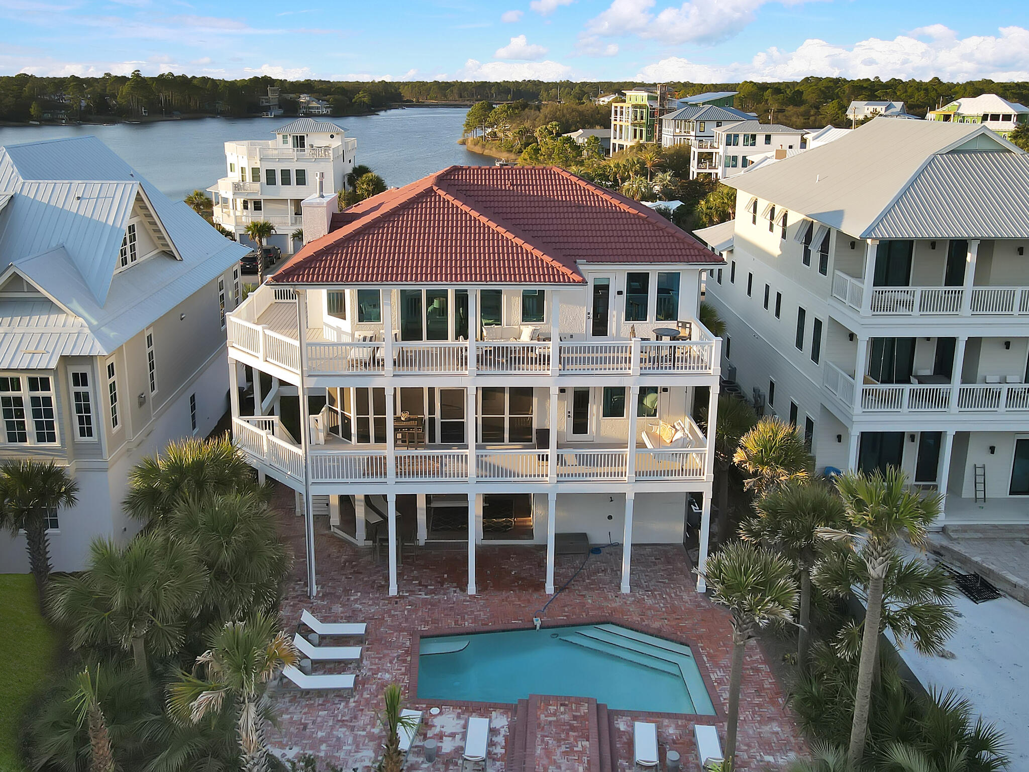 Nestled in the heart of 30A featuring gulf and lake views, this home features sought out architecture with refined finishes. The expansive and well thought out floor plan offers high ceilings, modern touches, solid wood flooring, and ample outdoor space with designated entertainment areas that are perfect for showcasing the white sand beaches and turquoise hued waters. Your views will remain unobstructed as the dunes in front of the home are protected. The private carriage house offers a beautiful chefs kitchen, bedroom, bathroom, laundry room, and living space with views of the water. This space can accommodate large gatherings and the 3 car garage offers tons of storage for your personal belongings. This residence is the epitome of luxury.